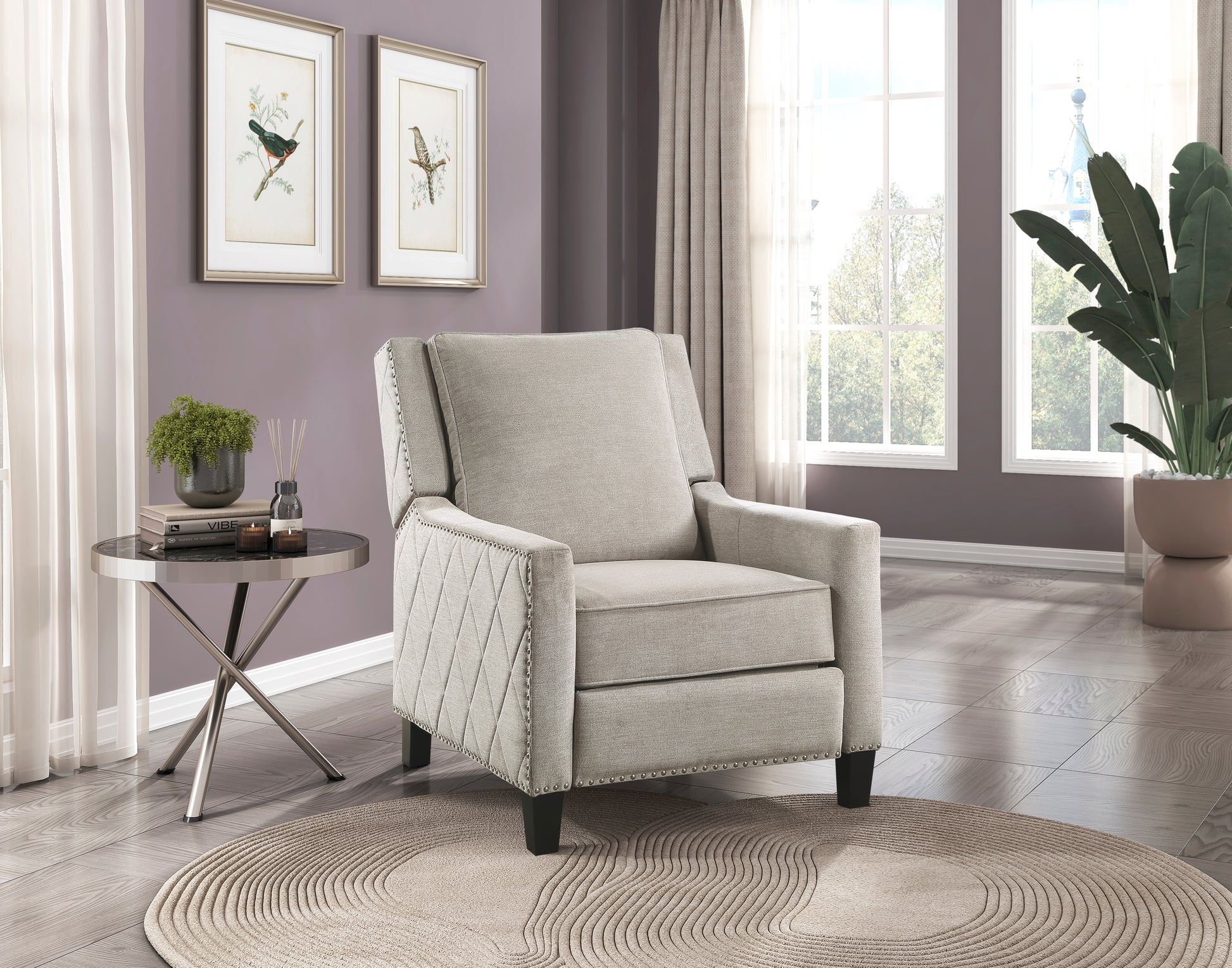 Comfortable grey fabric recliner chair with studded diamond pattern on arms