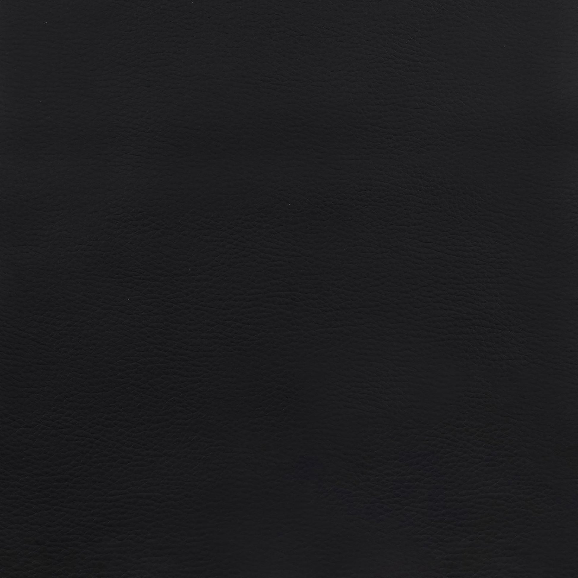 Black textured leather material sample for upholstery and fashion