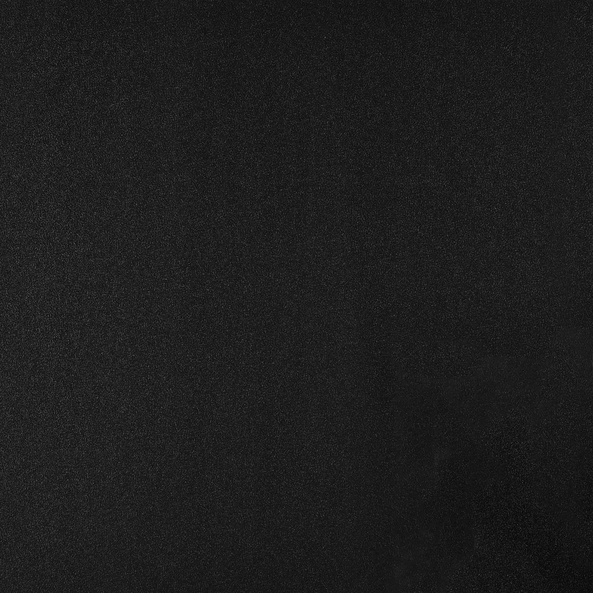 Solid black textured background with a subtle grainy finish