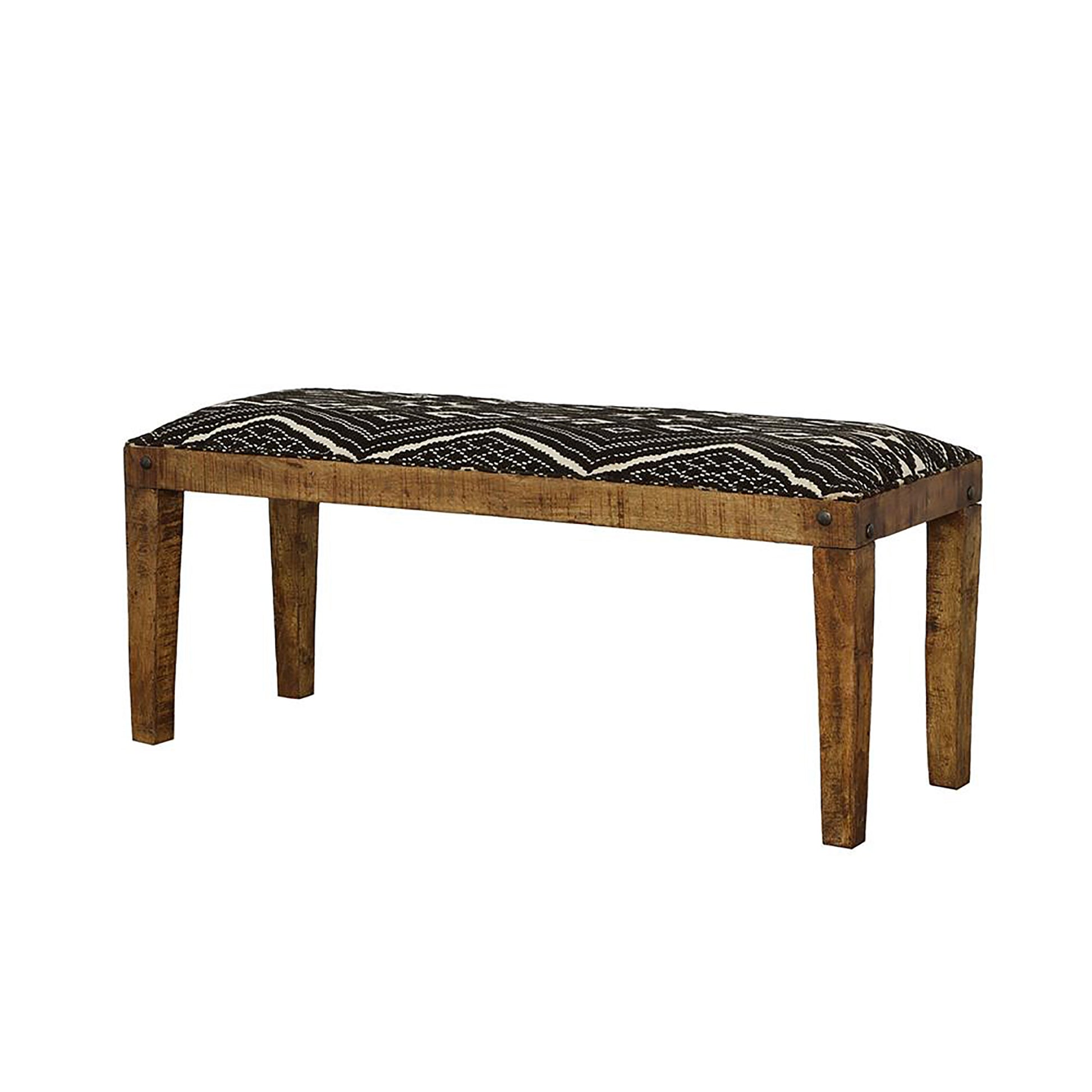 Rustic wood bench with black and white geometric patterned upholstered seat