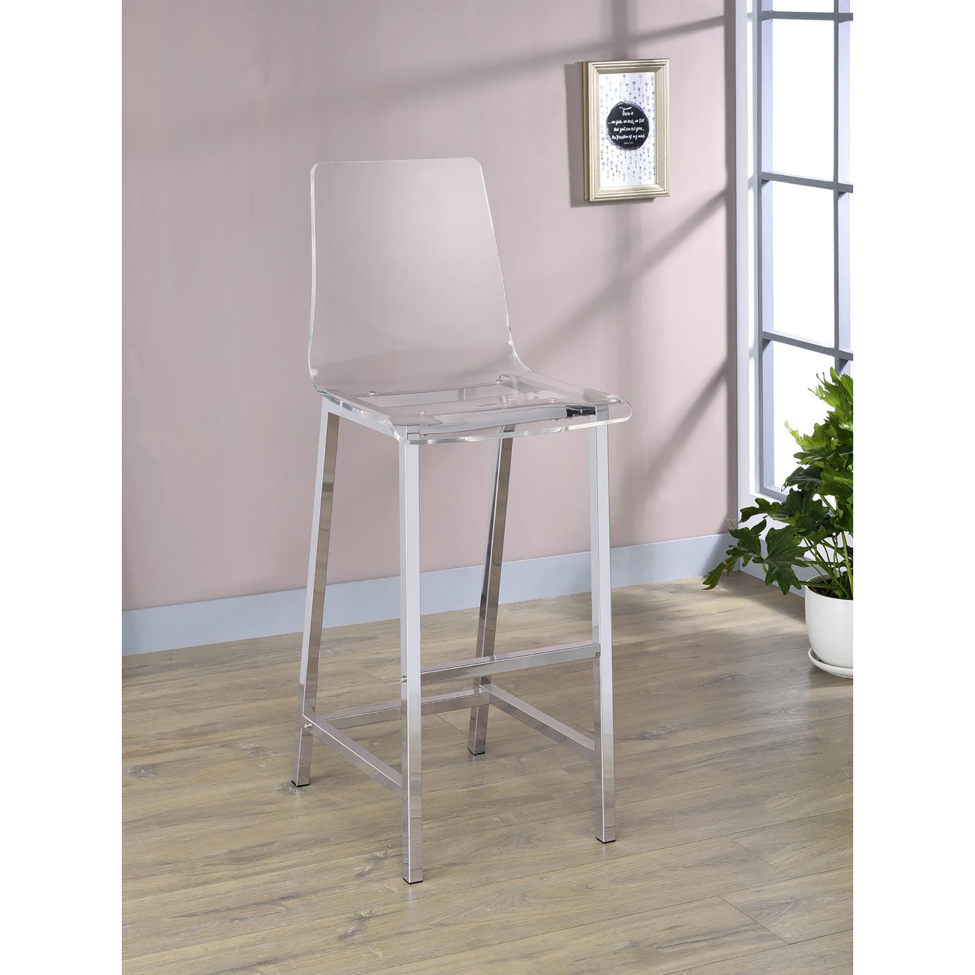 Transparent acrylic bar stool with polished chrome legs for modern kitchens