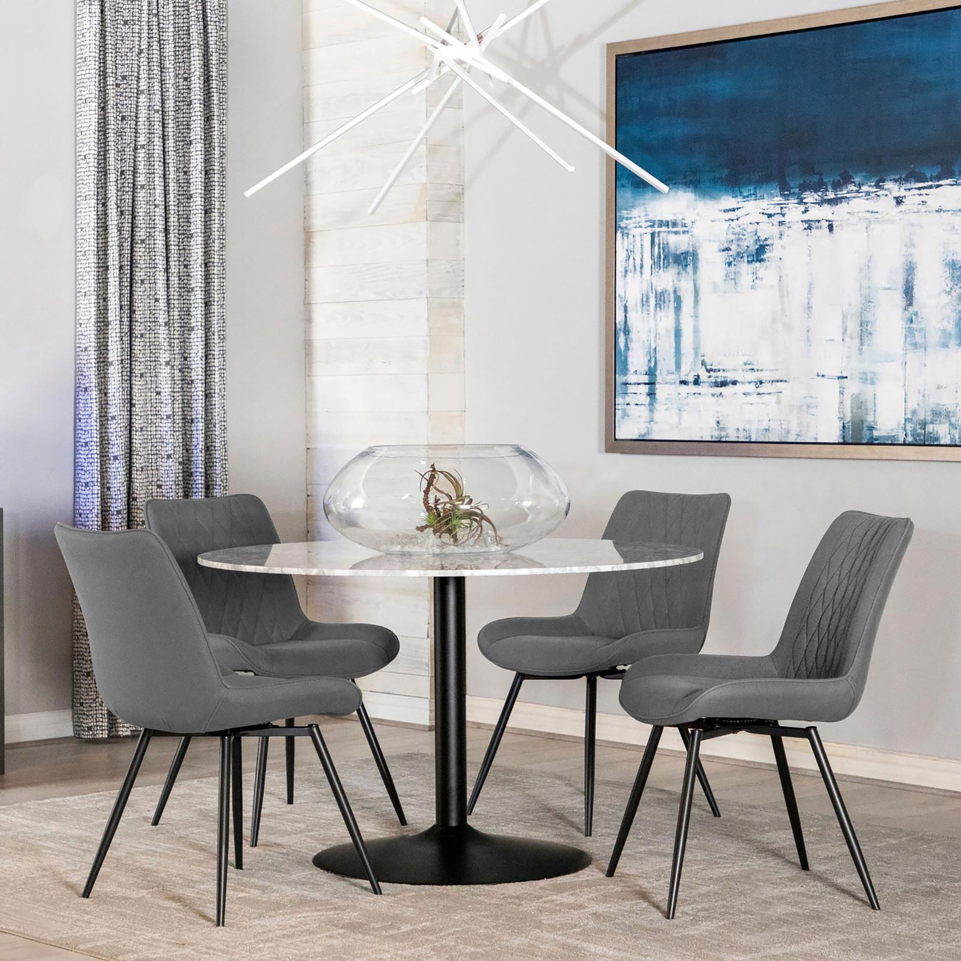 Modern grey dining chair with diamond stitching and black metal legs