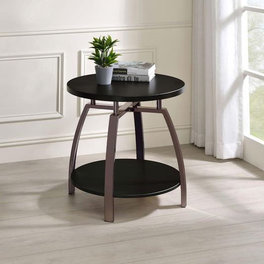 Round black accent table with metal legs and a lower shelf