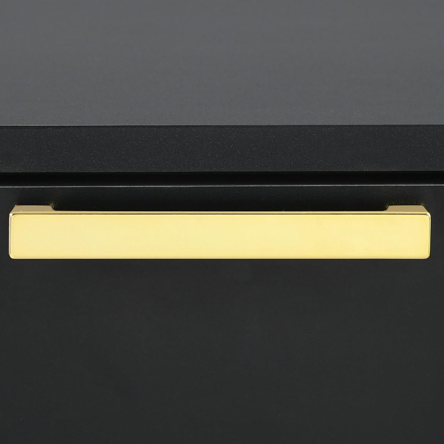 Modern rectangular brass cabinet pull with matte black finish