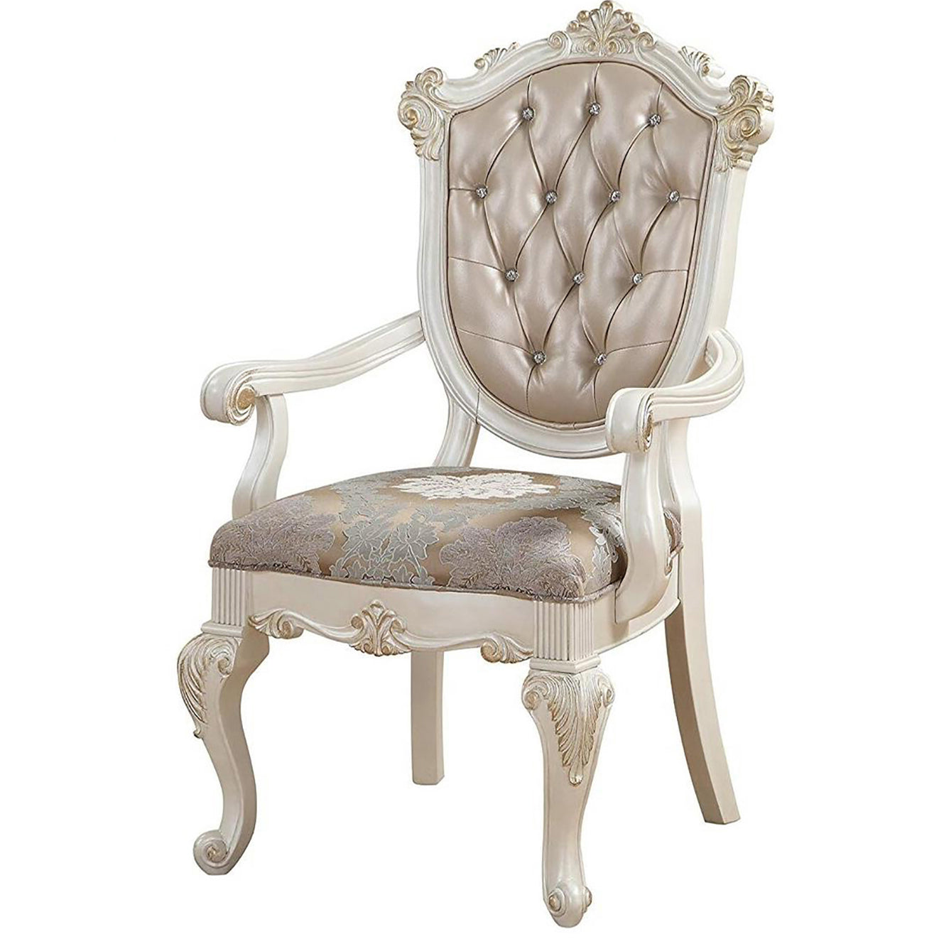 Ornate carved accent chair with tufted champagne upholstery and damask seat