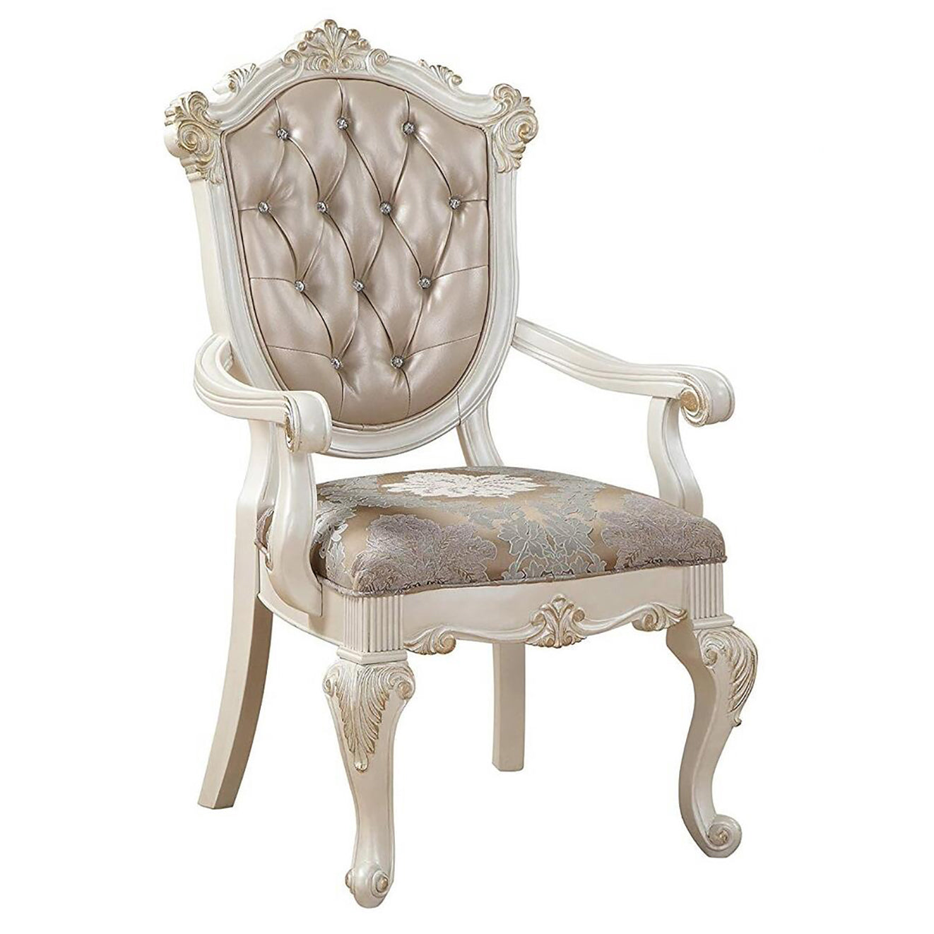 Ornate tufted cream armchair with carved wood accents and damask upholstered seat