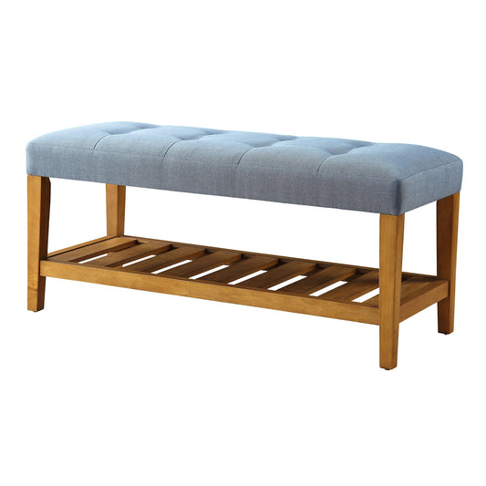 Tufted light blue fabric bench with wooden frame and slatted shoe shelf