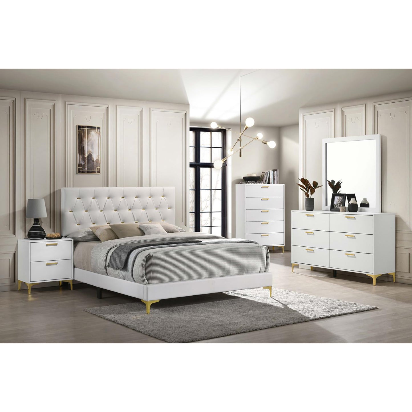 White tufted upholstered platform bed with gold accents and striped bedding