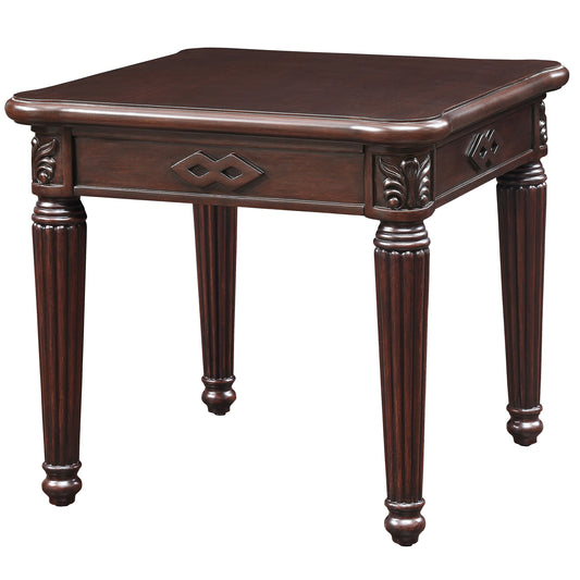 Dark brown traditional wood end table with fluted legs and carved details