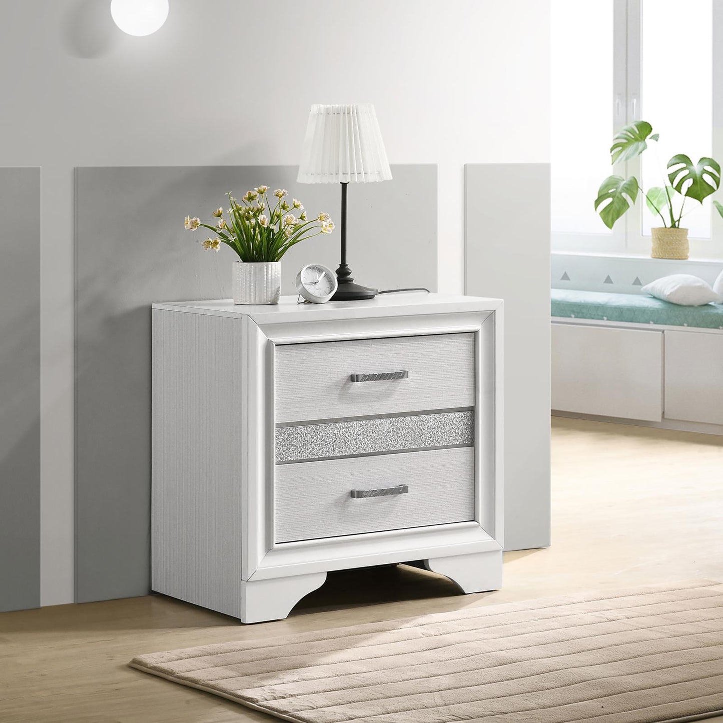 White twodrawer nightstand with silver drawer pulls and a glitter accent strip