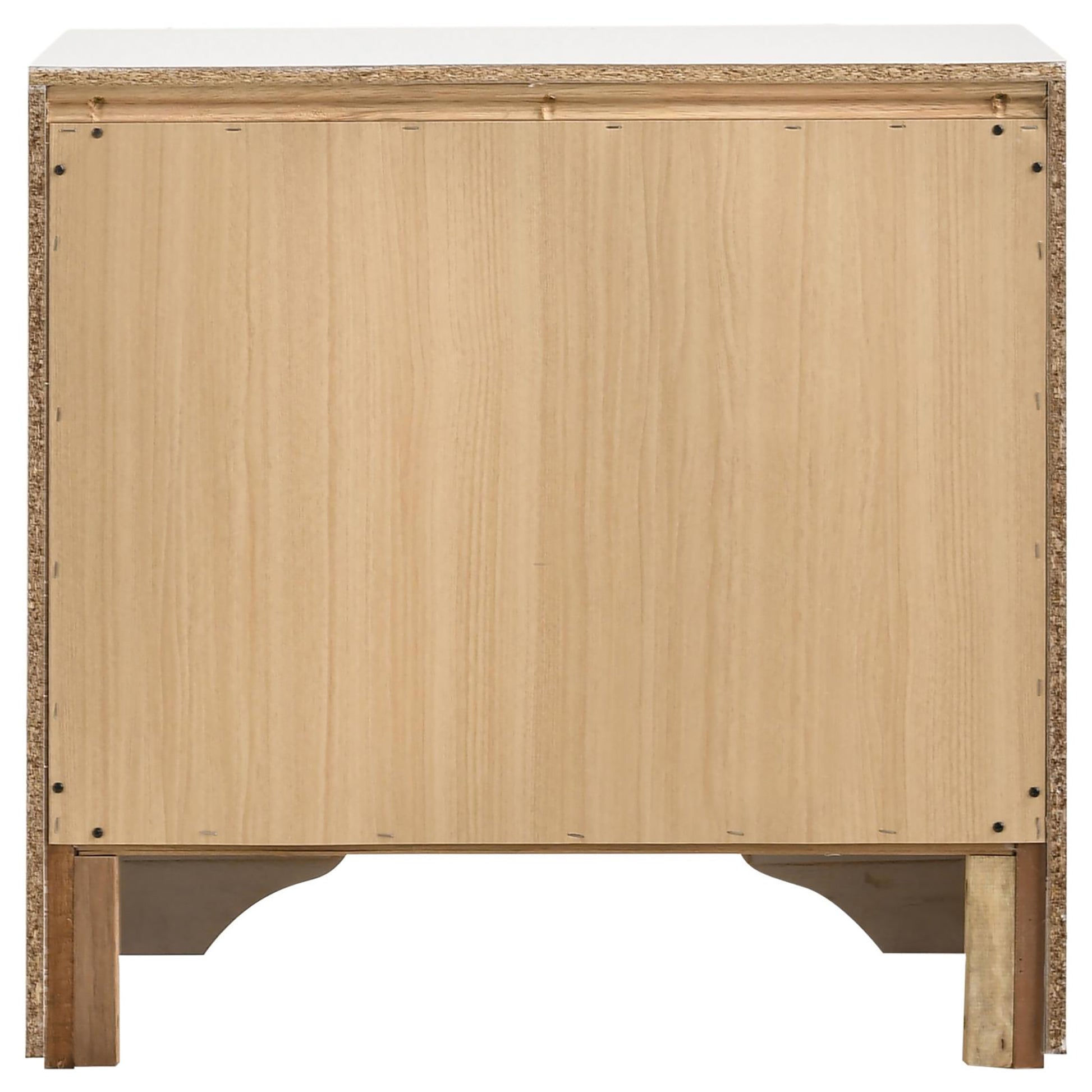 Back panel of a light oak dresser with visible construction screws and particleboard edges