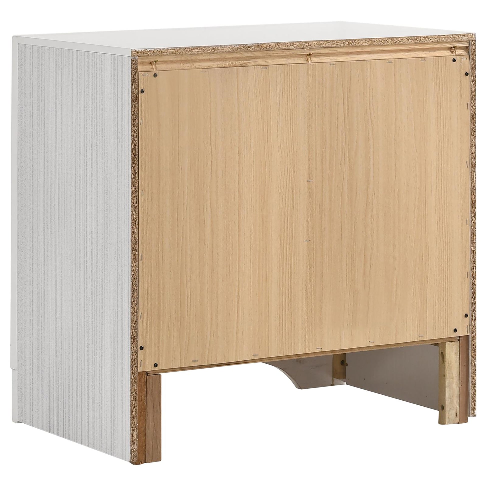 White textured side panel of a modern nightstand with exposed particleboard back