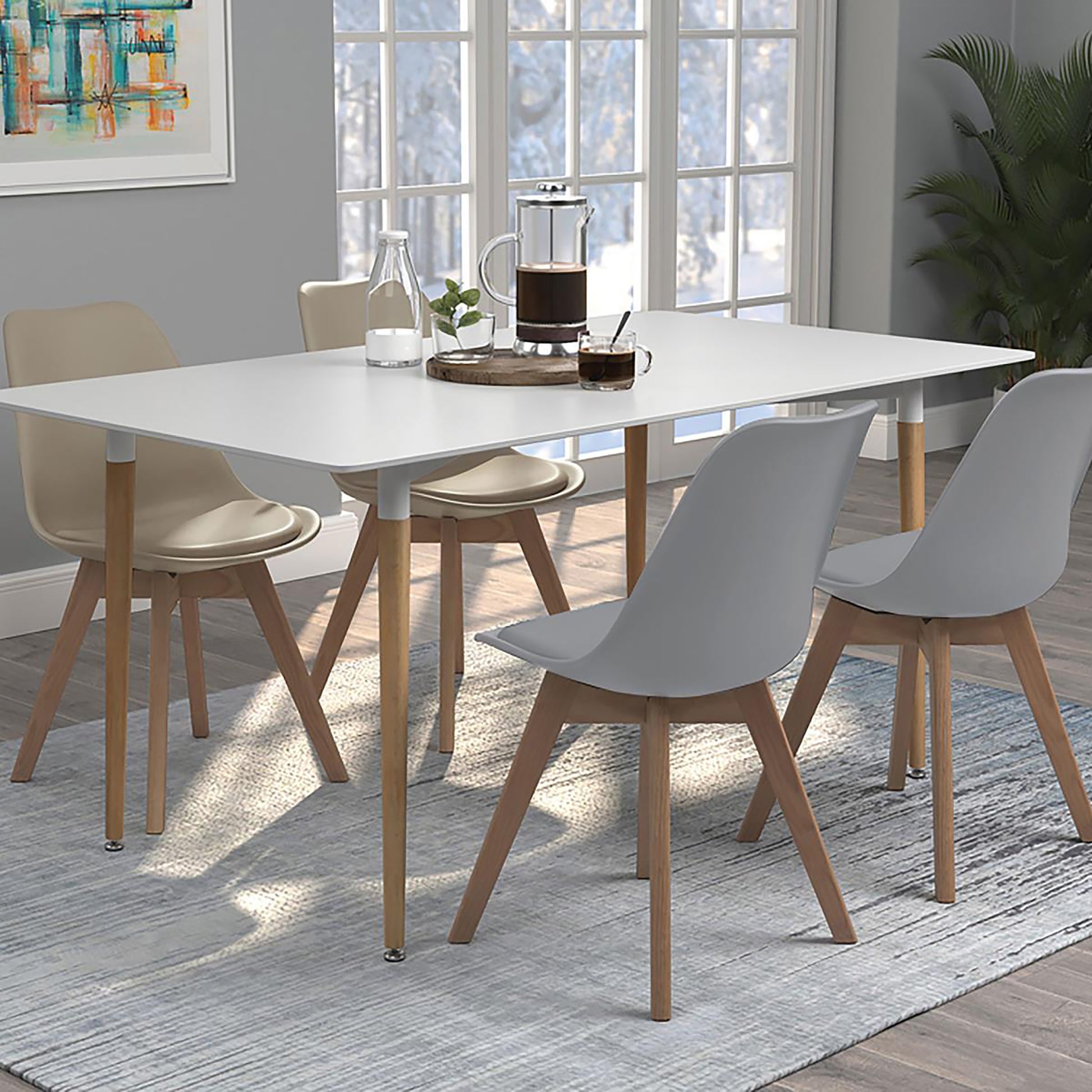 Modern white rectangular dining table with natural wood legs seats four