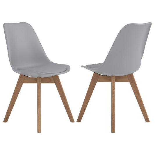 Two light gray dining chairs with natural wood legs and a modern curved seat design