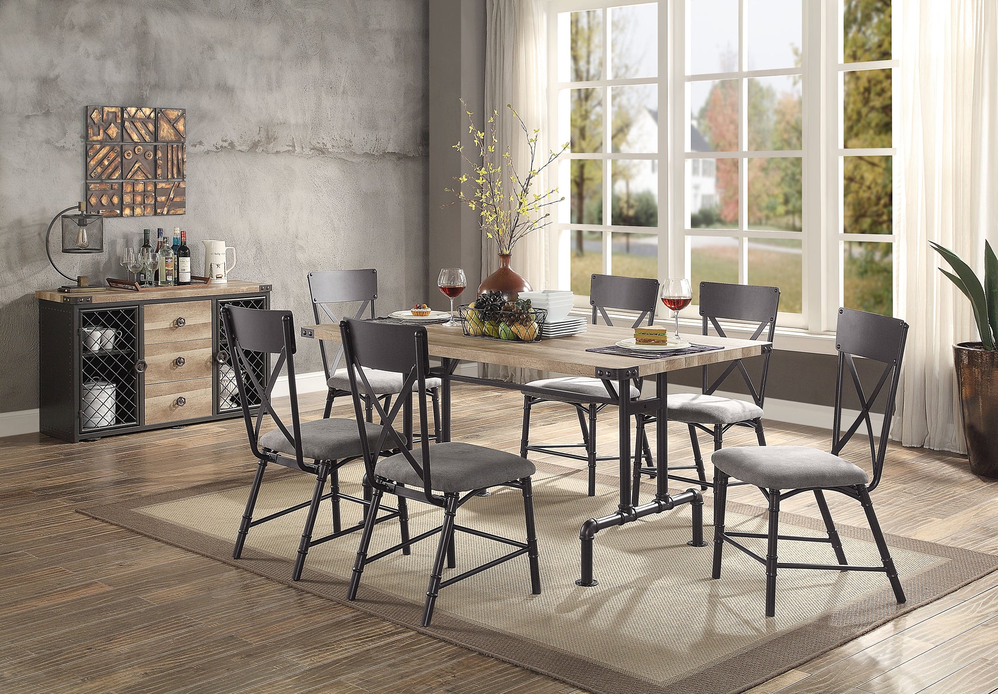 Industrial style dining set with a rustic wood table and grey upholstered chairs
