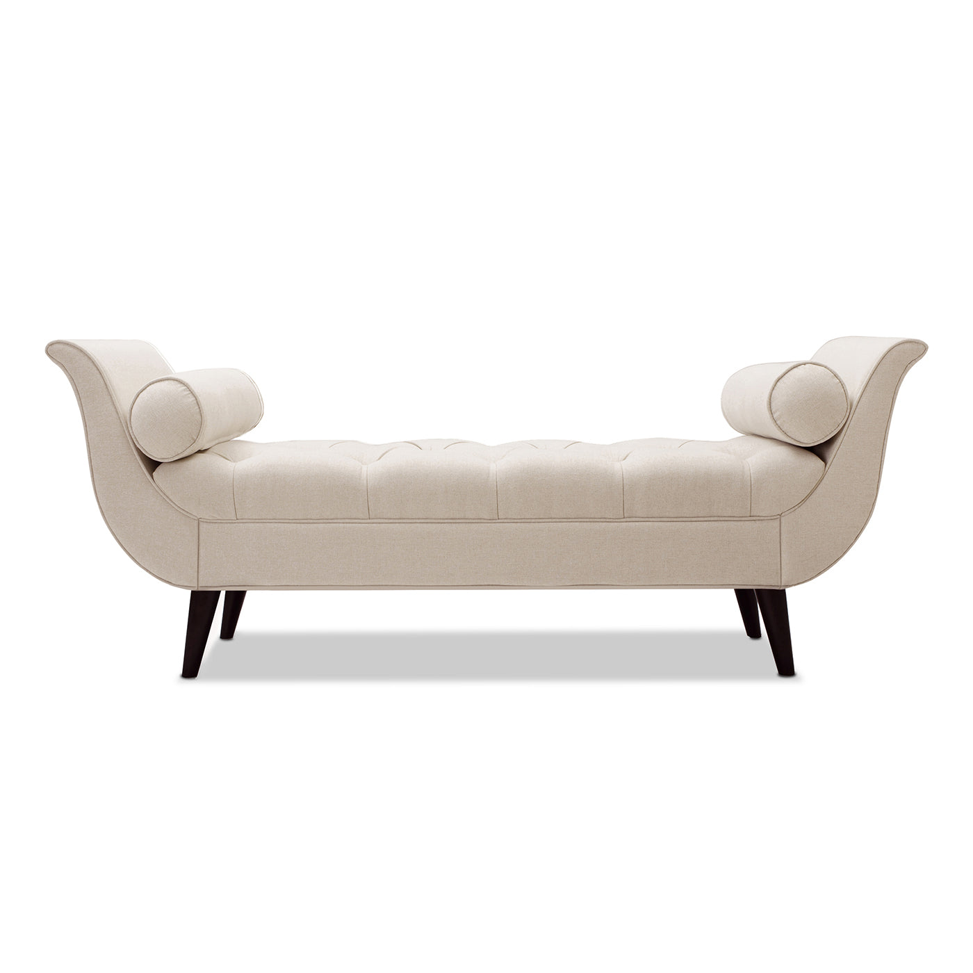 Elegant beige tufted chaise lounge with rolled bolsters and dark tapered legs