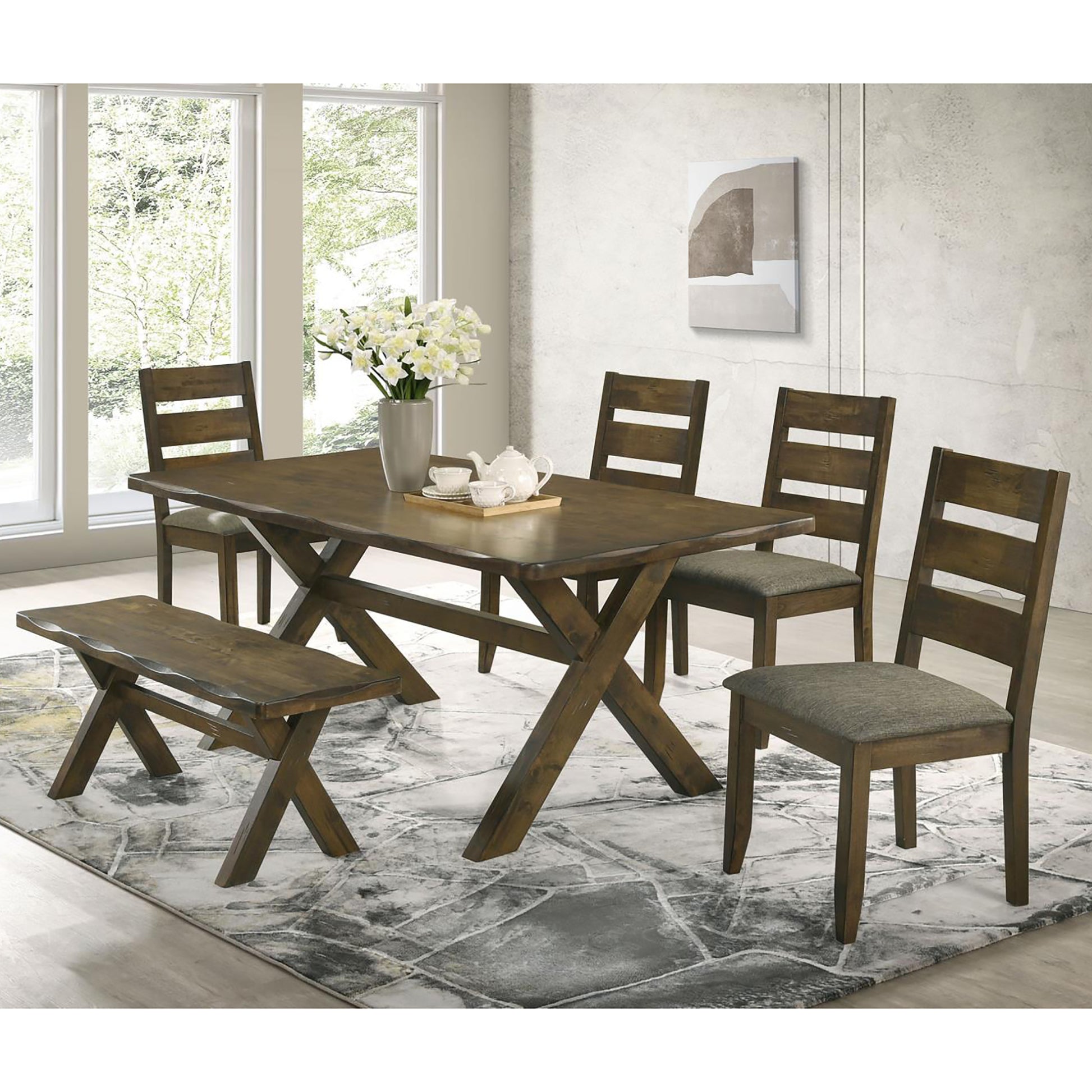 Rustic wooden dining table set with four chairs and a bench for family gatherings
