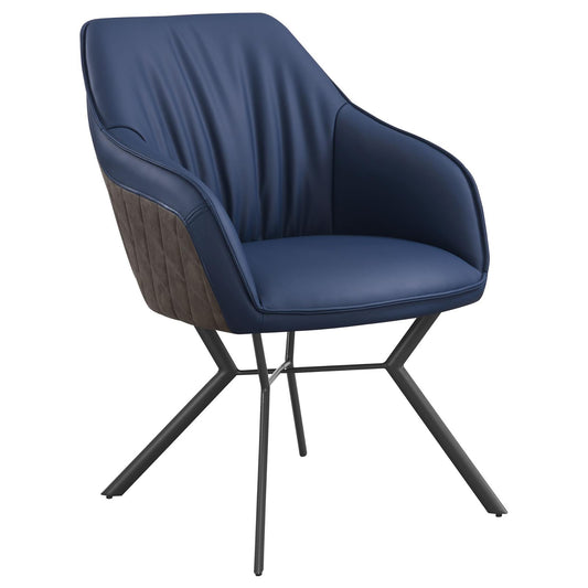 Blue upholstered accent chair with quilted side panels and black metal legs
