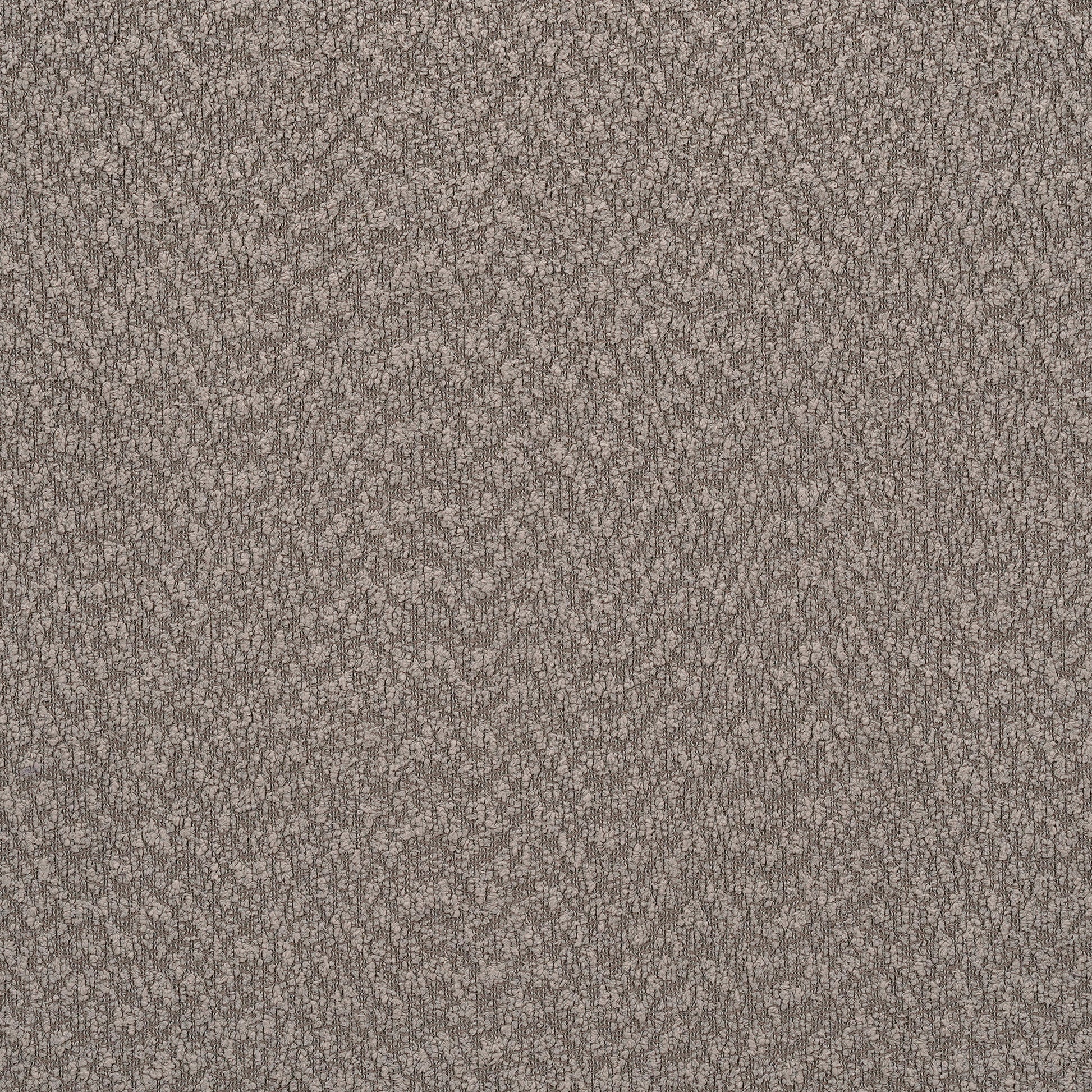 Closeup of textured beige carpet soft looped pile ideal for home flooring