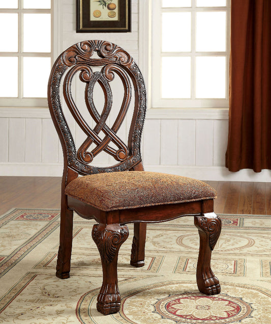 Ornate carved mahogany dining chair with patterned upholstered seat classic style