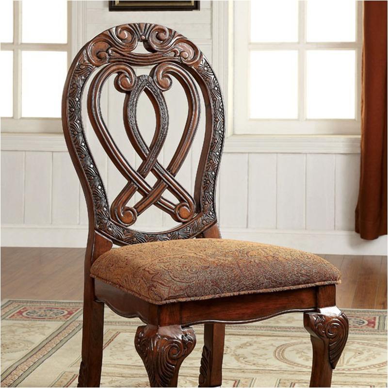 Ornate dark wood dining chair with intricate Celtic knot back and brown patterned upholstery
