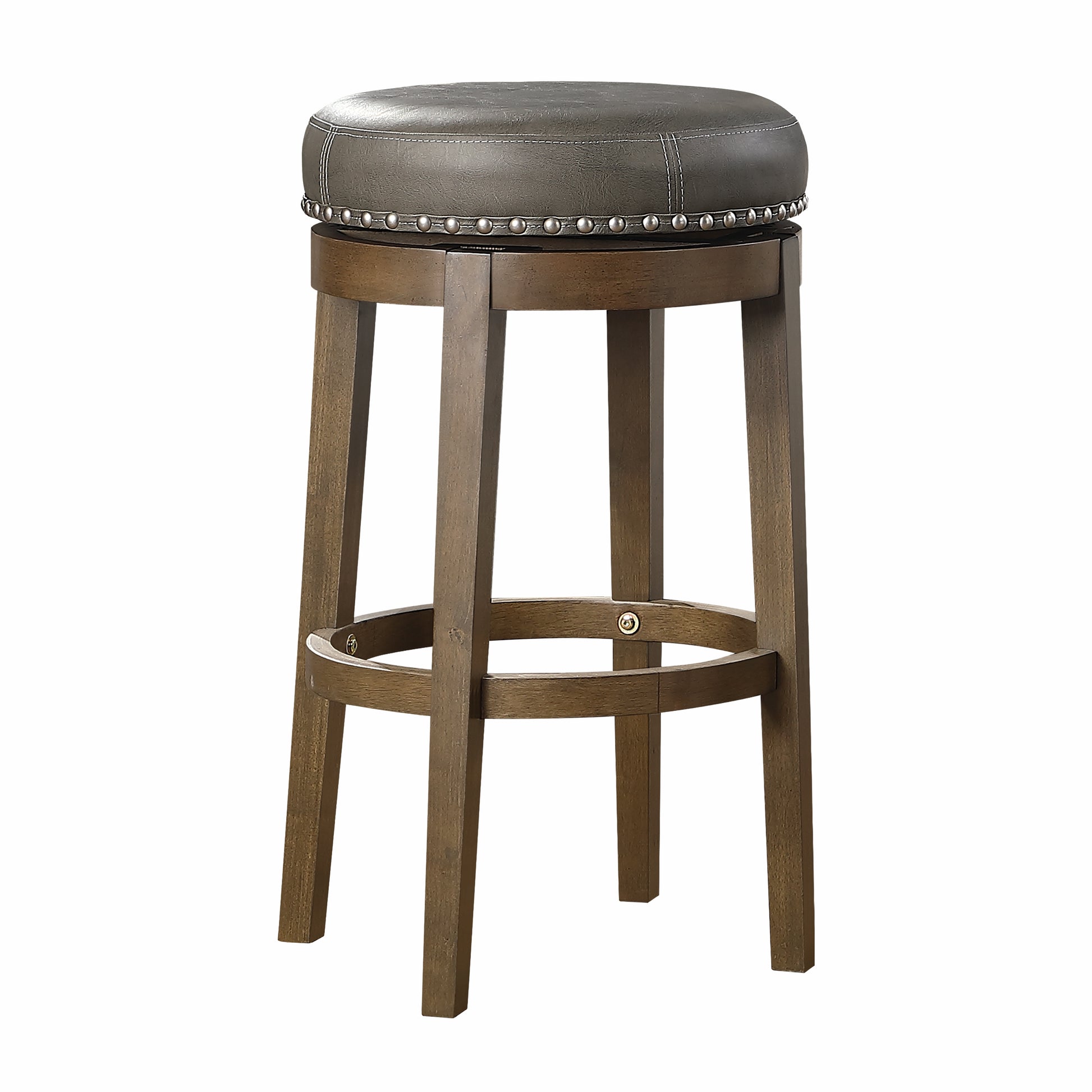 Brown wooden bar stool with a gray faux leather padded seat and silver nailhead trim