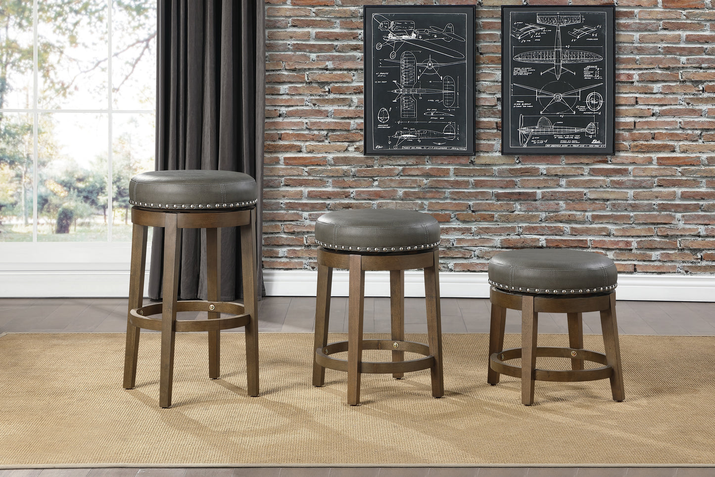 Swivel bar stool with grey faux leather seat and silver nailhead trim on wooden legs