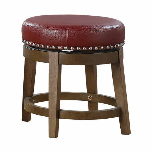 Crimson leather swivel bar stool with decorative nailhead trim and wooden base