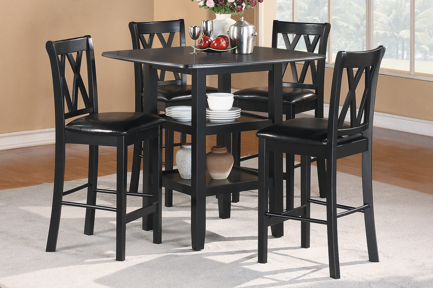 Black square counter height table with four upholstered stools for dining
