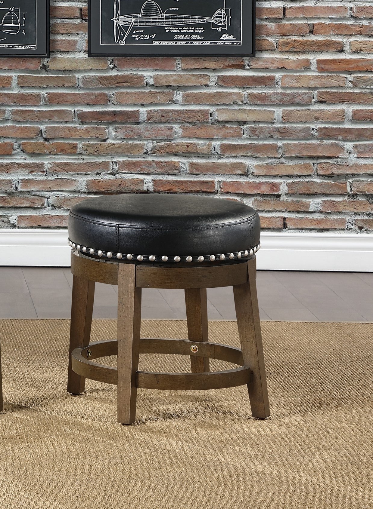 Black leather swivel bar stool with nailhead trim and wooden base
