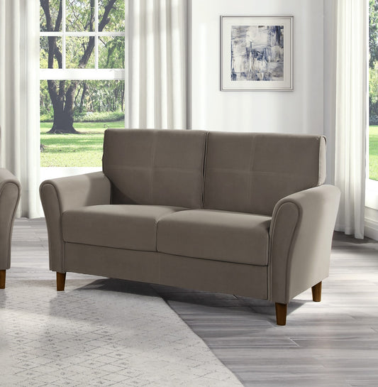 Taupe fabric loveseat with tufted back curved arms and dark wood legs