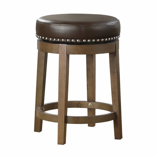 Dark brown faux leather bar stool with nailhead trim and wooden legs