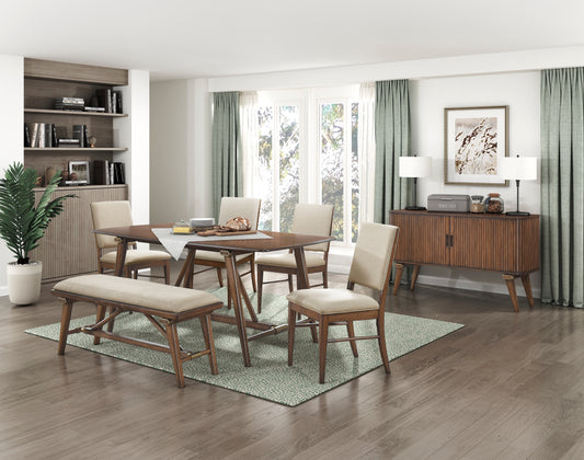 Midcentury modern walnut dining table with upholstered chairs and bench seating