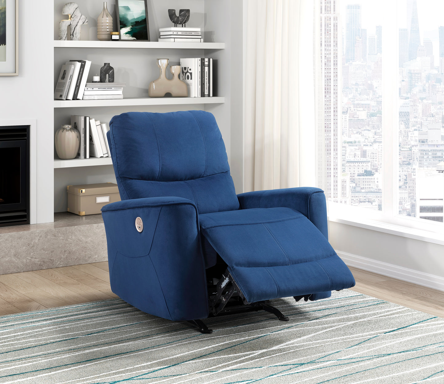 Blue power recliner chair with padded arms and lumbar support