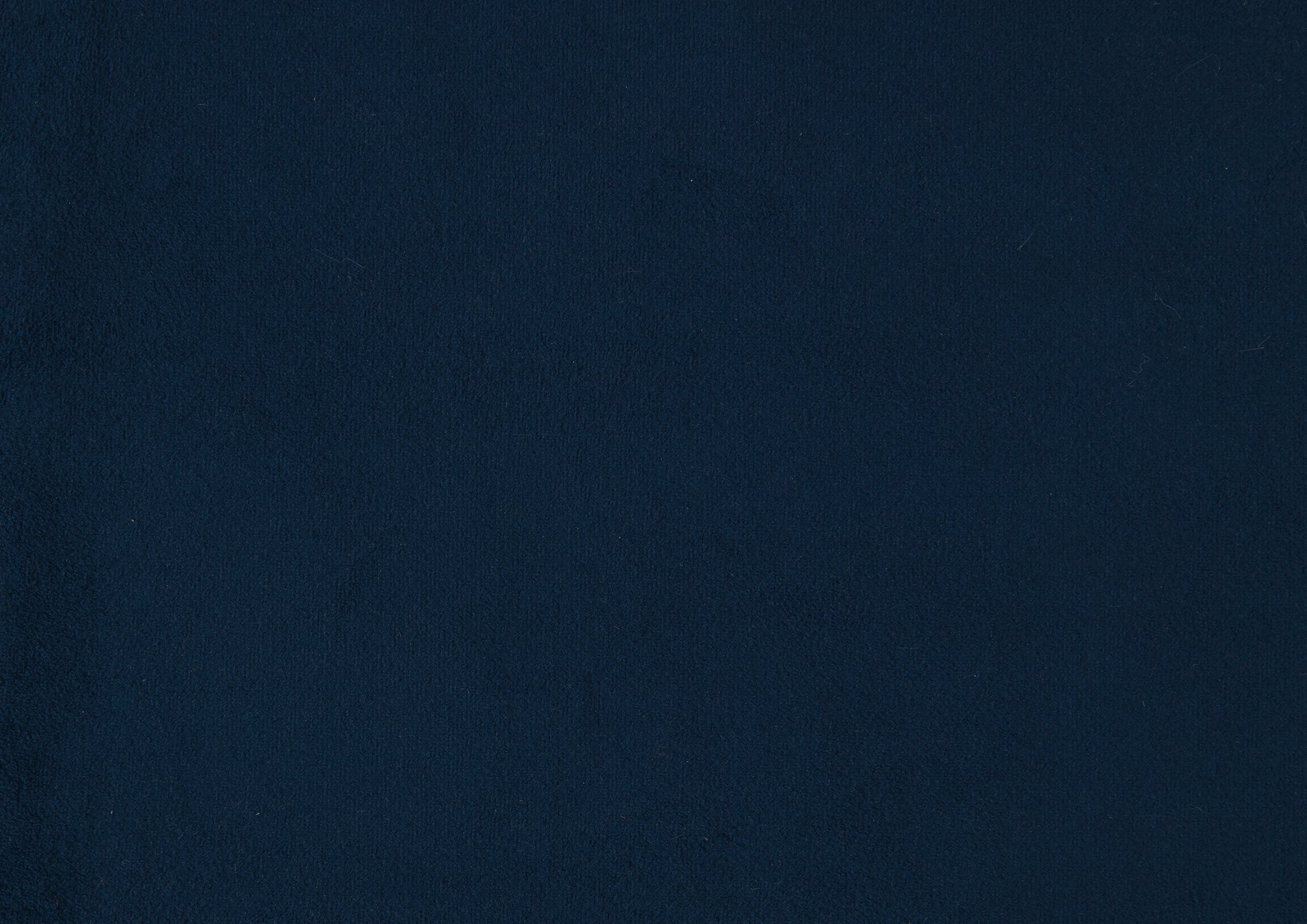 Navy blue textured cotton fabric swatch for apparel