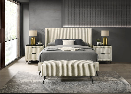 Textured cream wingback bed with grey bedding and matching upholstered bench