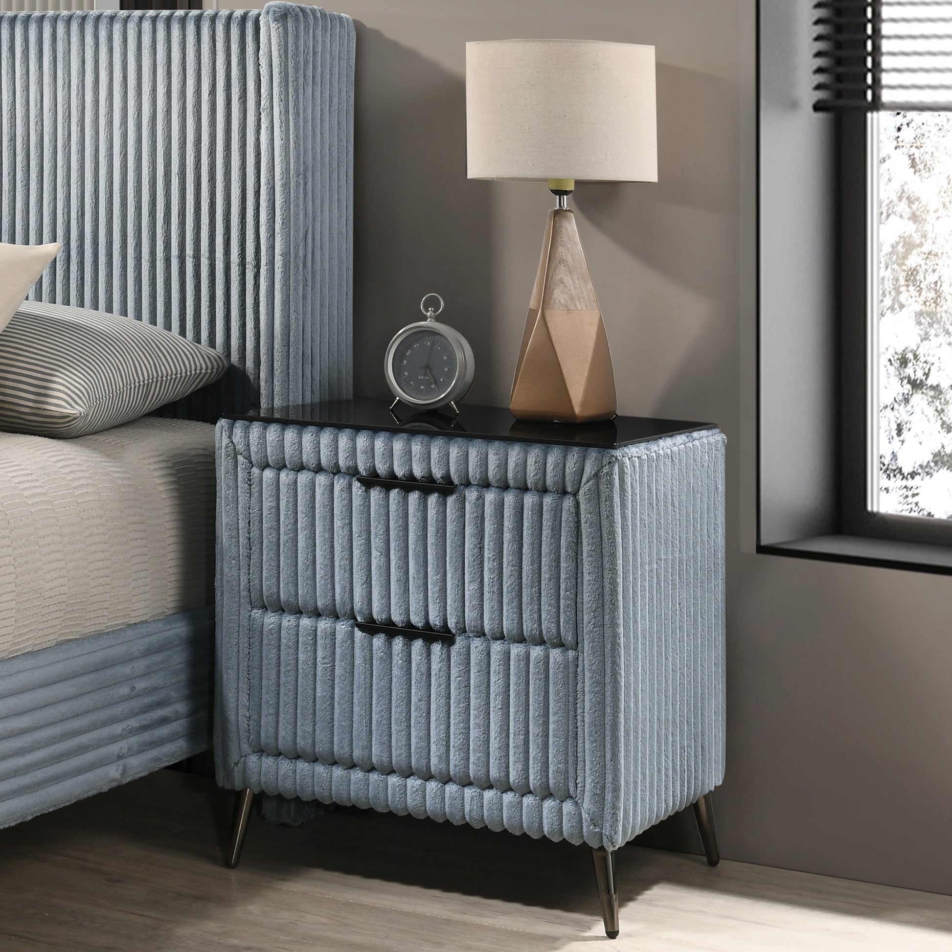 Blue corduroy bedside table with two drawers and gold hardware