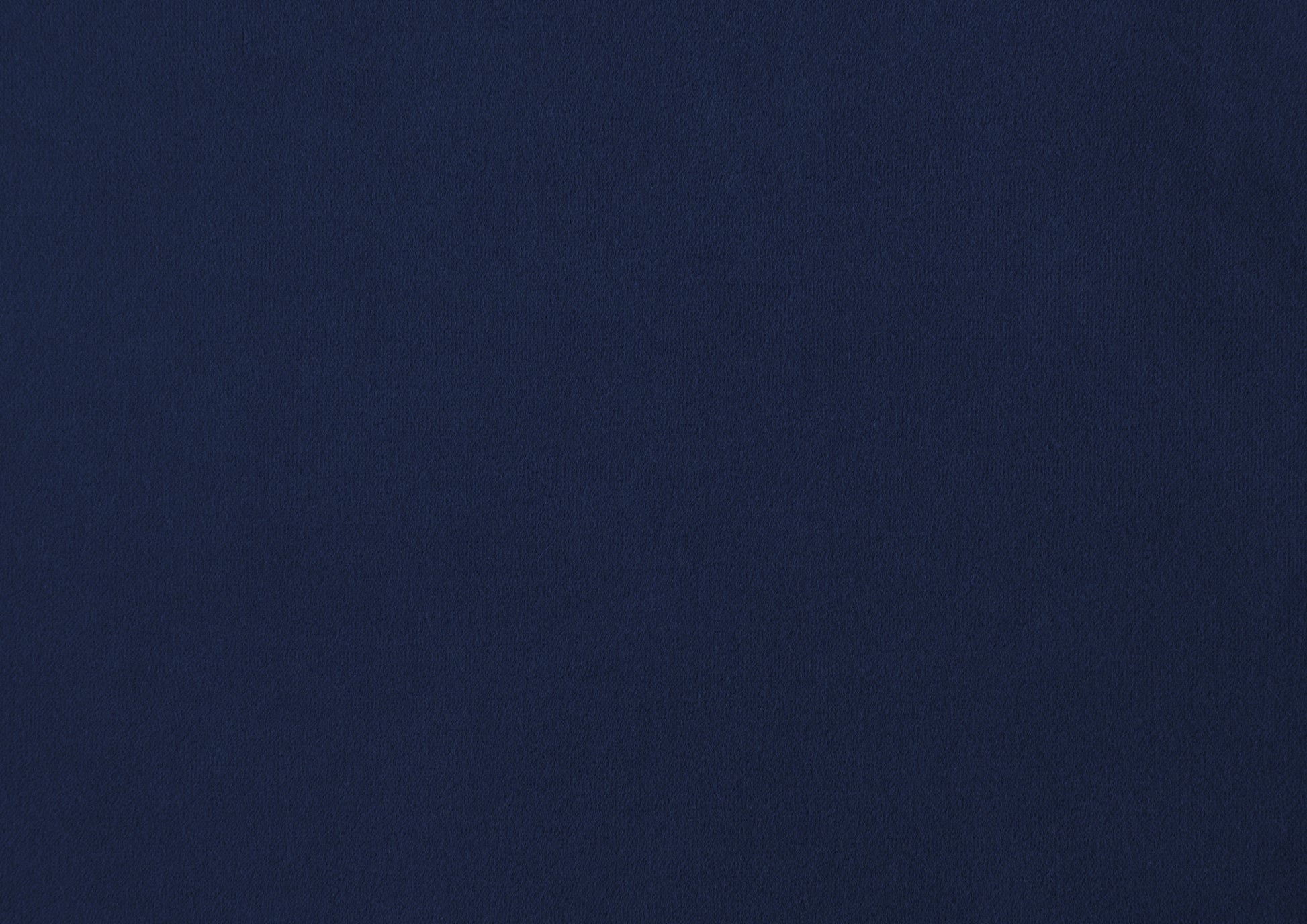 Deep navy blue textured fabric ideal for upholstery or durable clothing