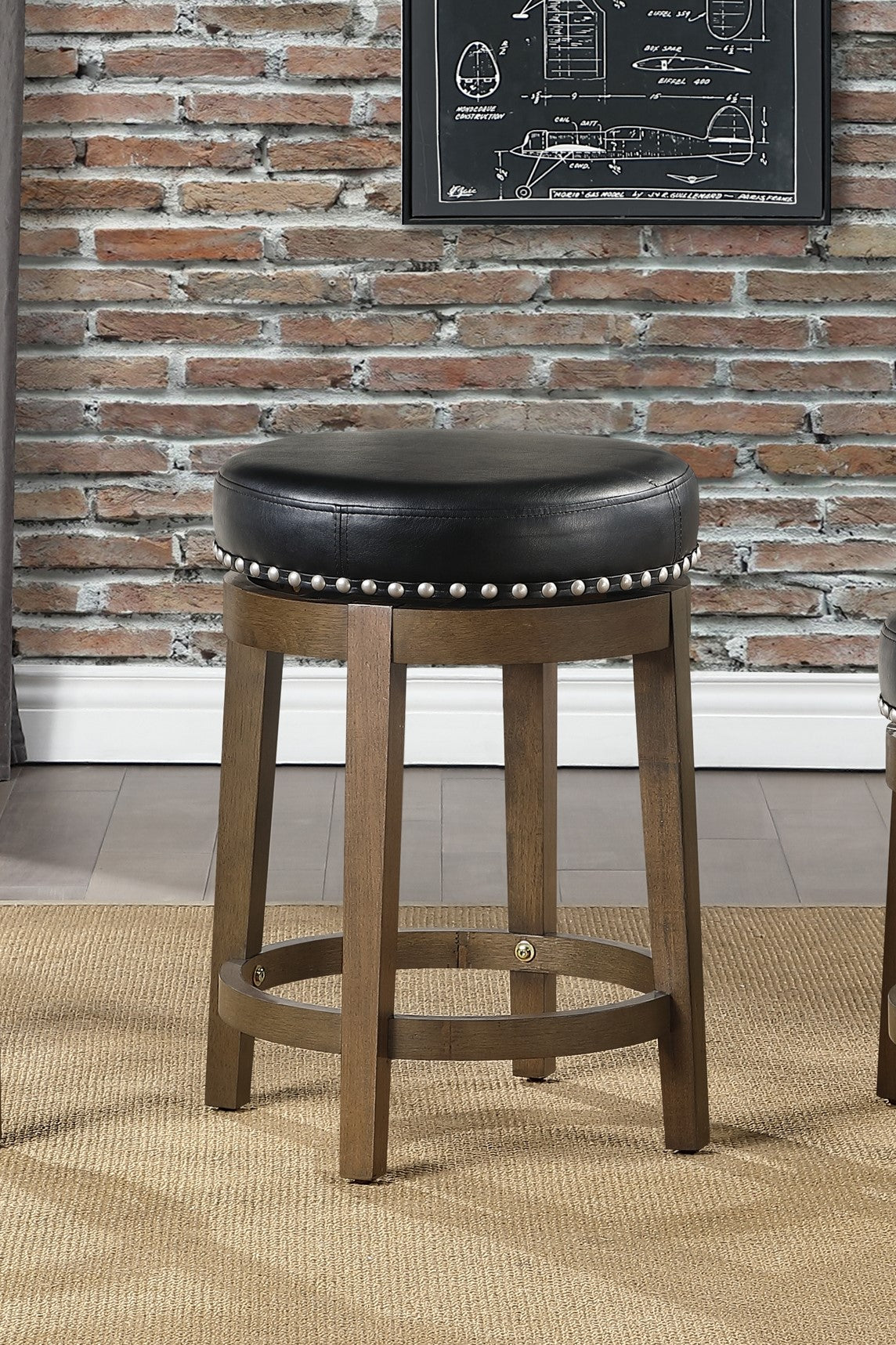 Black leather swivel bar stool with silver nailhead trim and wooden base