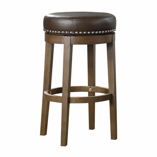 Brown leather swivel bar stool with nailhead trim and wooden legs