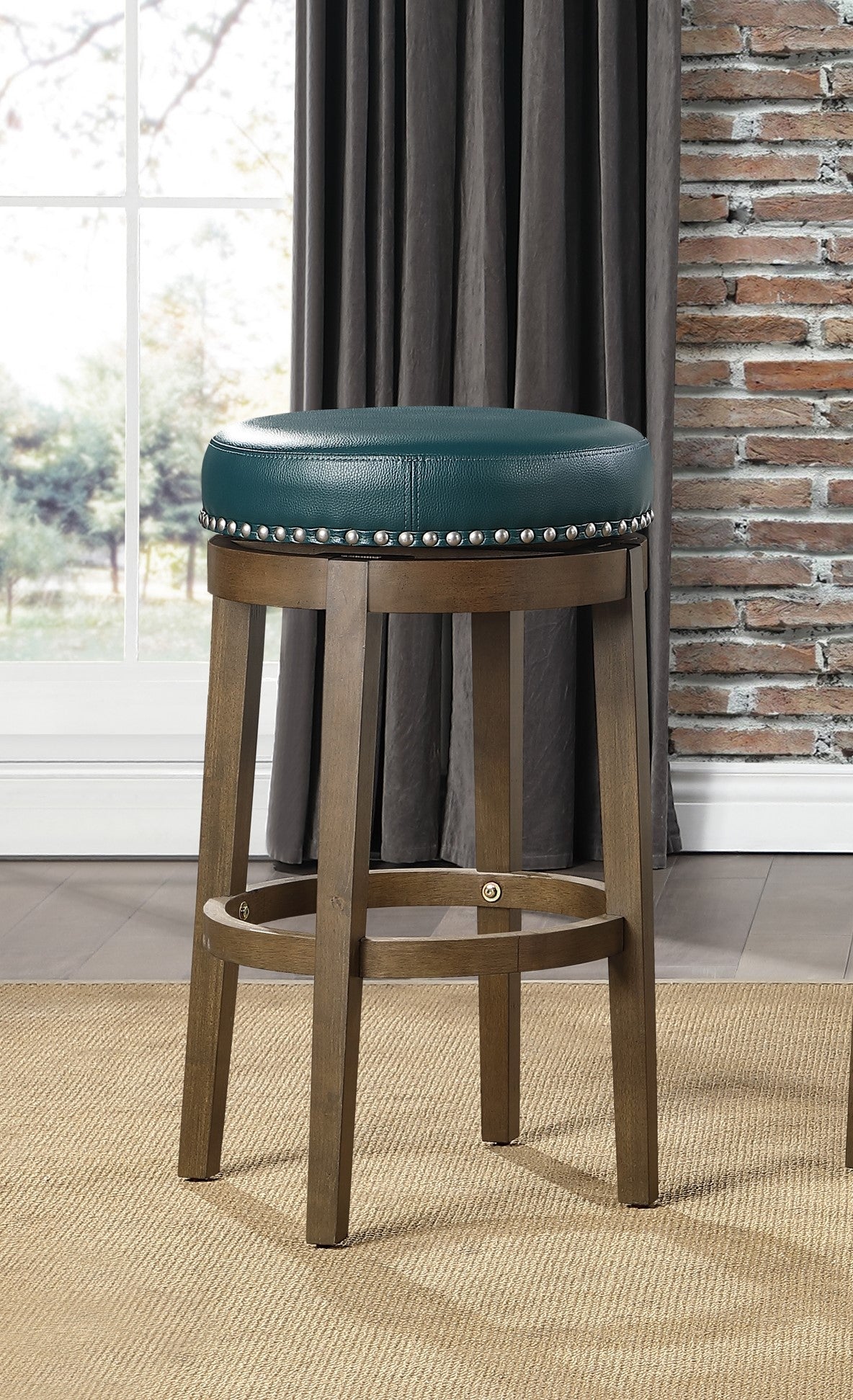Teal swivel bar stool with studded detail and wooden base ideal for kitchen island