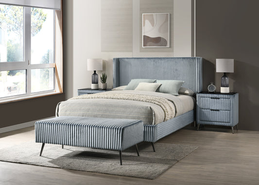 Blue velvet king bed with pleated design and matching nightstands