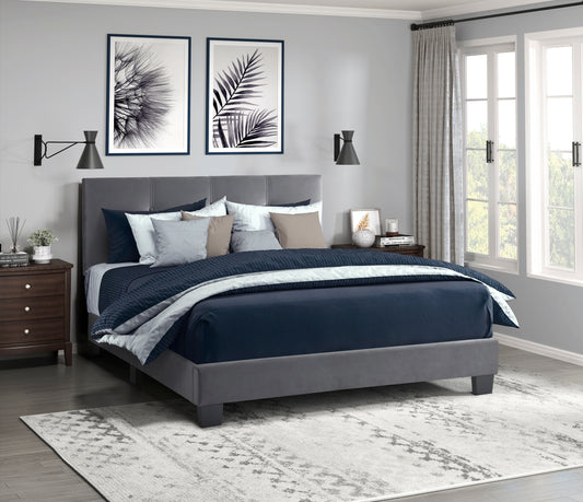 Modern grey velvet queen bed frame with upholstered headboard and navy bedding