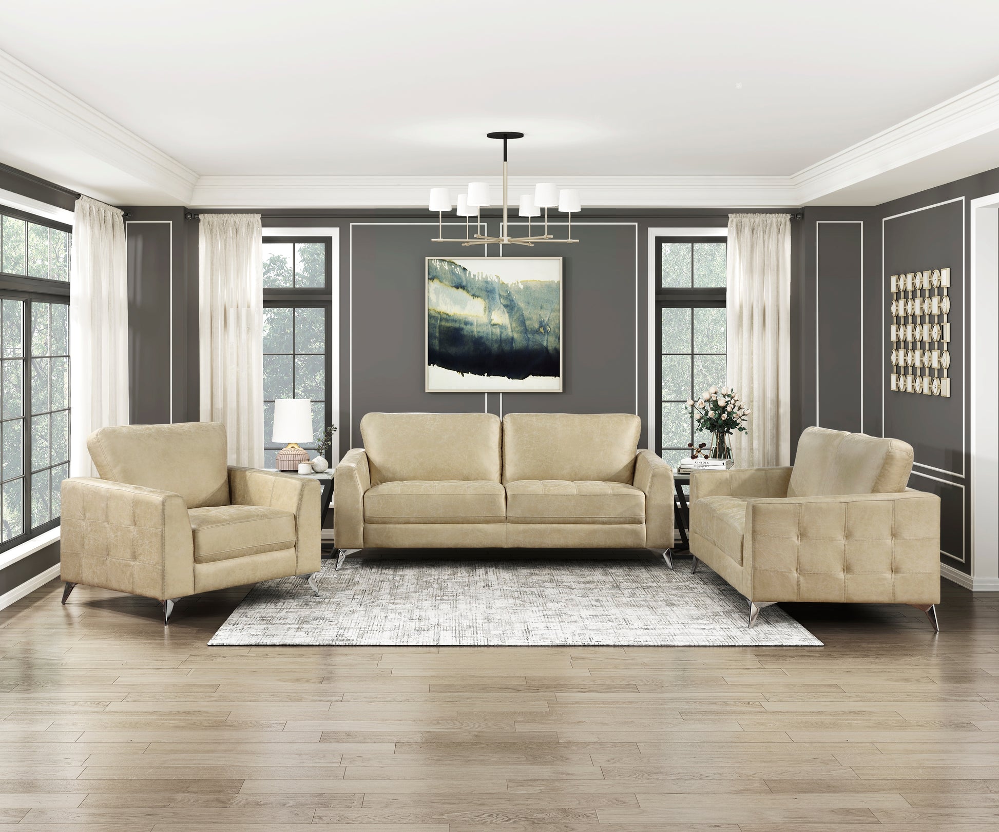 Tan leather sofa with tufted seat cushions and chrome legs for living room seating