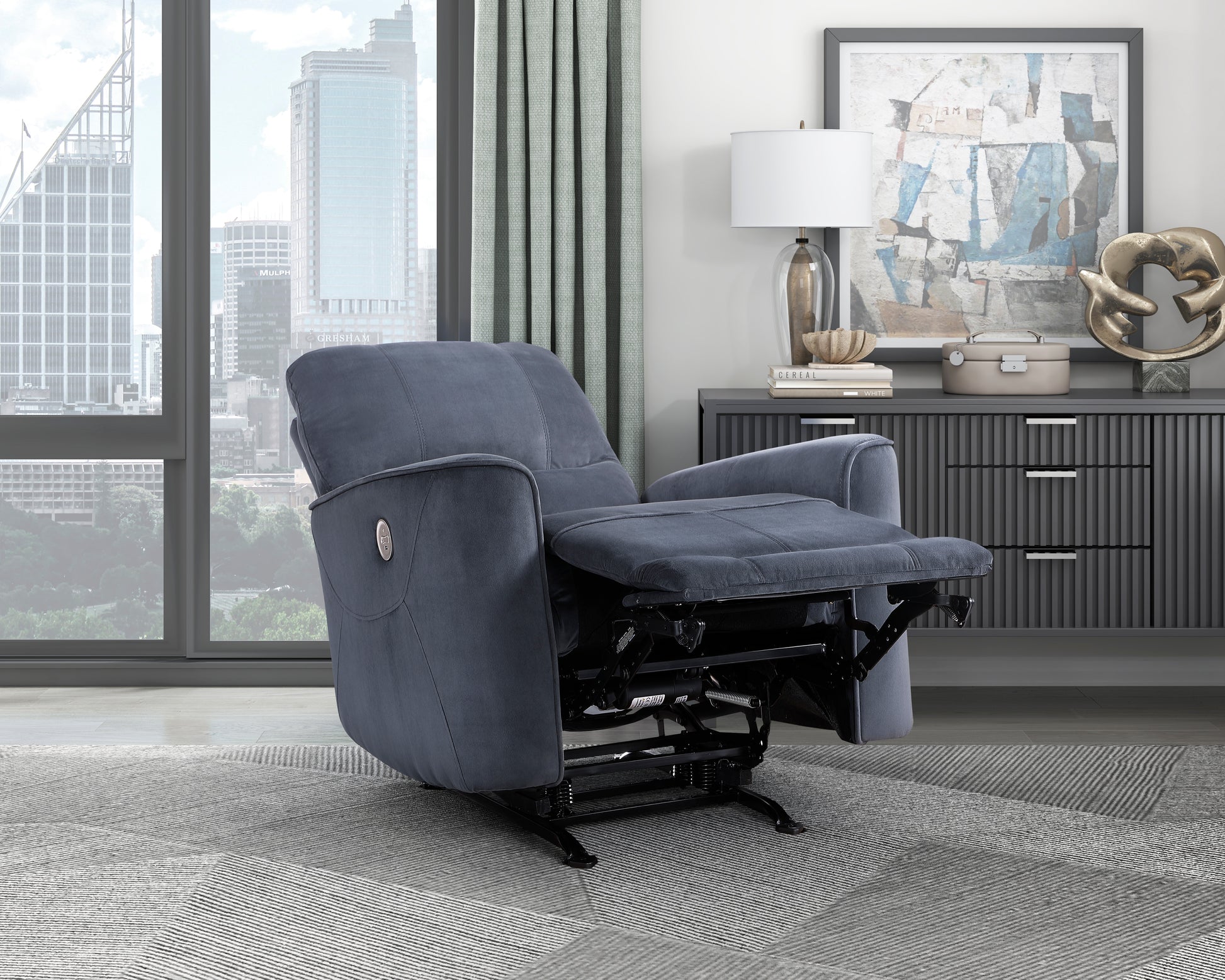 Dark grey fabric power recliner with extended footrest and media console