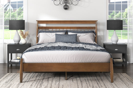 Wooden platform bed frame with a spindle headboard and white bedding
