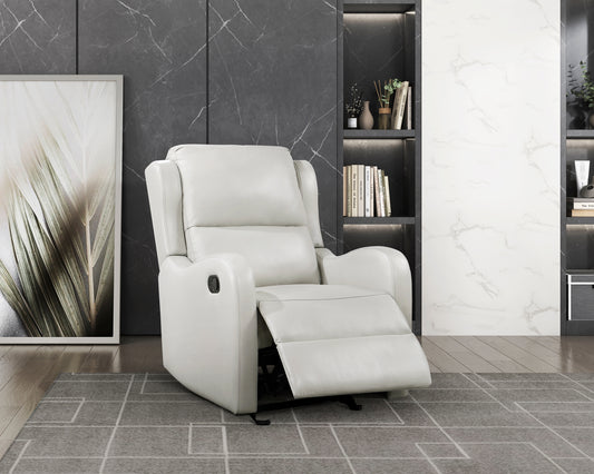 Comfortable white leather recliner chair with a reclining footrest in a modern living room setting
