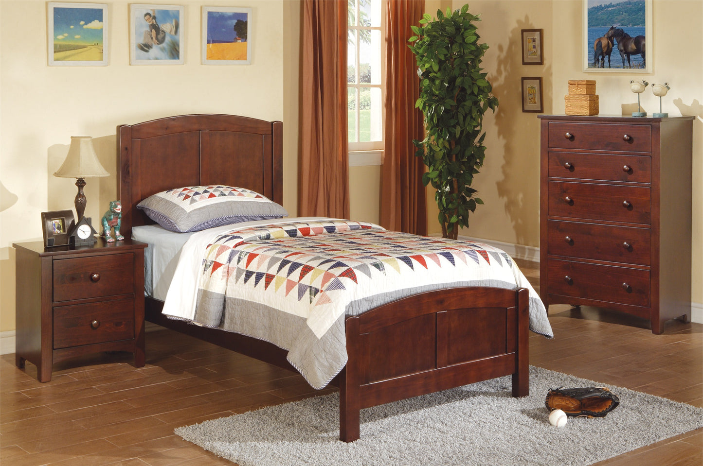 Dark wood twin bed frame with a patterned quilt and pillow