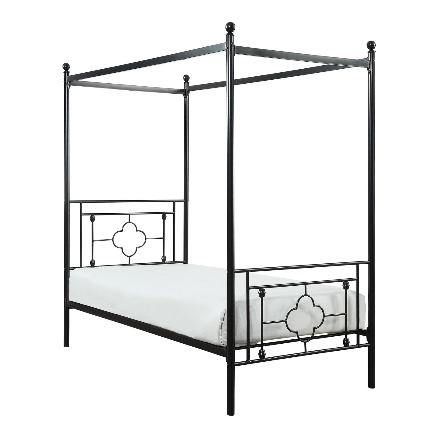 Black metal four poster bed frame with decorative clover details and white mattress