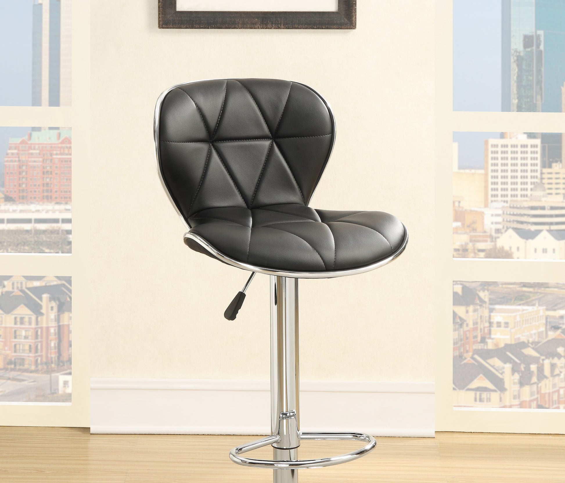 Black faux leather bar stool with diamond stitching and chrome base ideal for modern kitchens